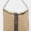 Gucci GG Canvas Shoulder Bag 1 Gucci GG Canvas Shoulder Bag -Jewelry Accessories cd7d9ab7 db0c 434f 8a1b 3937e41087c8